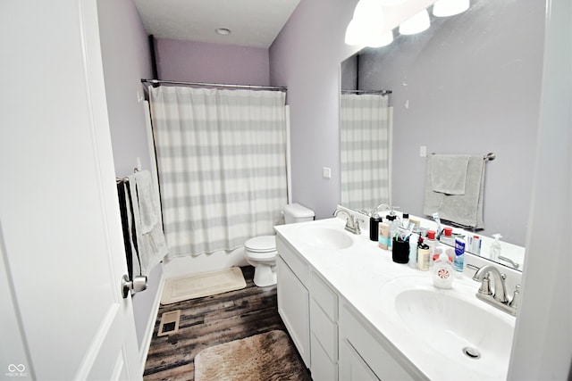 6362 W Friends Way Ct, Paragon, IN 46166 - full bathroom featuring wood finished floors and double vanity