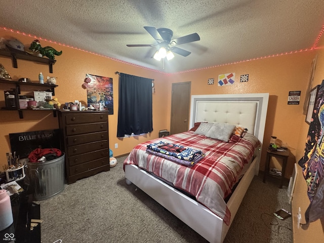 1214 Lindsey Ln, Lebanon, IN 46052 - bedroom featuring carpet floors, a textured ceiling, and a ceiling fan