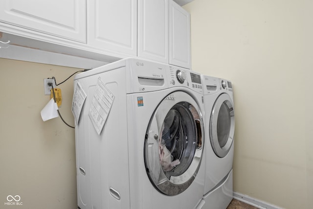 10721 Chesapeake Dr S, Indianapolis, IN 46236 - laundry area with separate washer and dryer and cabinet space