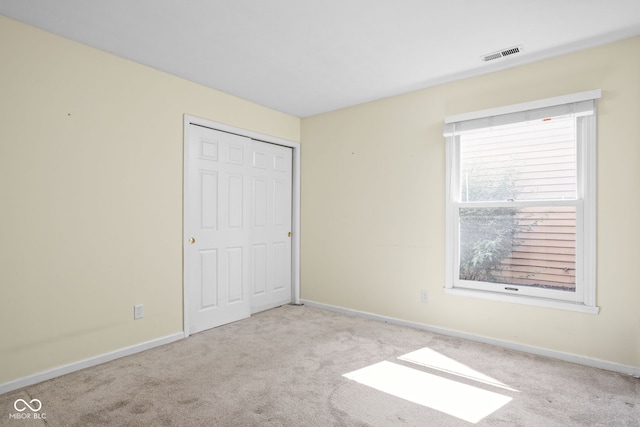 10721 Chesapeake Dr S, Indianapolis, IN 46236 - unfurnished bedroom featuring carpet and a closet