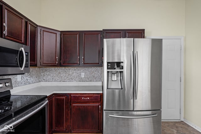 10721 Chesapeake Dr S, Indianapolis, IN 46236 - kitchen featuring stainless steel appliances, dark brown cabinets, light countertops, and backsplash