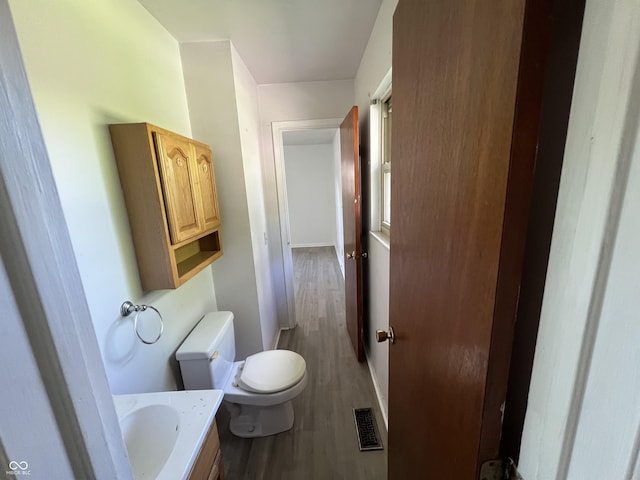 1615 S 9th Ave, Beech Grove, IN 46107 - half bathroom featuring wood finished floors and vanity