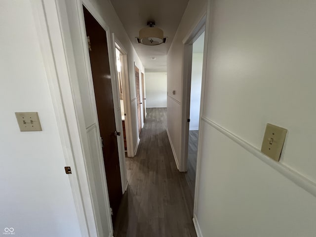 1615 S 9th Ave, Beech Grove, IN 46107 - hall with dark wood-type flooring and baseboards