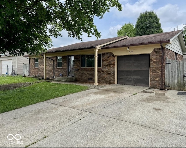 1615 S 9th Ave, Beech Grove, IN 46107 - single story home featuring an attached garage, driveway, and brick siding