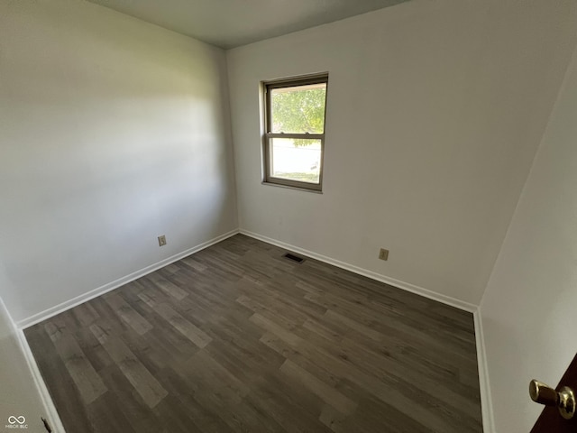 1615 S 9th Ave, Beech Grove, IN 46107 - unfurnished room with dark wood-style floors