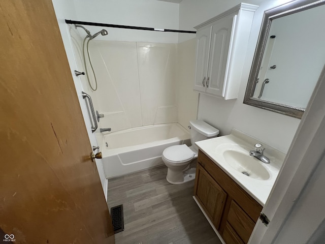 1615 S 9th Ave, Beech Grove, IN 46107 - full bath with shower / tub combination, vanity, and wood finished floors