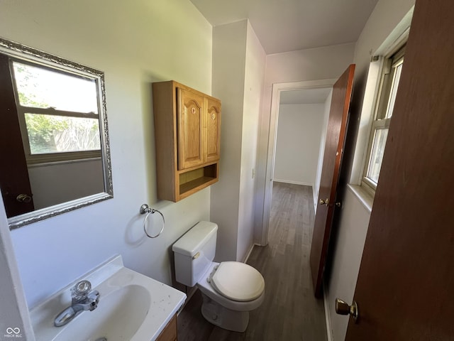 1615 S 9th Ave, Beech Grove, IN 46107 - half bath featuring wood finished floors and vanity