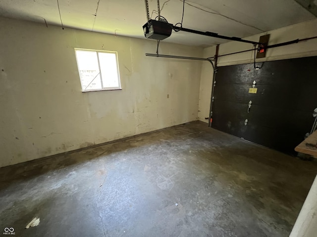 1615 S 9th Ave, Beech Grove, IN 46107 - garage featuring a garage door opener