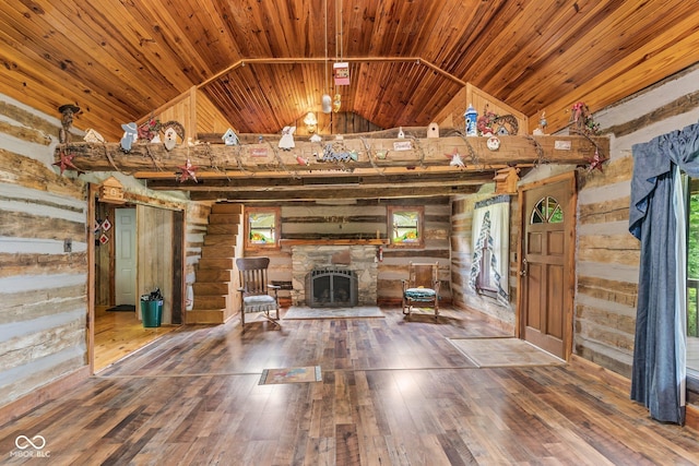 8701 E Splinter Ridge Rd, Madison, IN 47250 - unfurnished living room with wooden walls, hardwood / wood-style flooring, high vaulted ceiling, a fireplace, and wooden ceiling