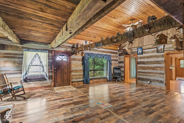 8701 E Splinter Ridge Rd, Madison, IN 47250 - unfurnished living room featuring wooden walls, wood finished floors, and a wood ceiling with exposed beams