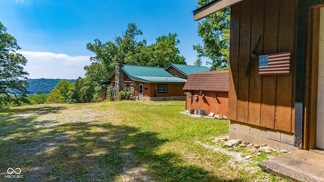 8701 E Splinter Ridge Rd, Madison, IN 47250 - view of green lawn featuring a shed