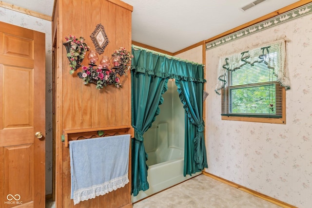 8701 E Splinter Ridge Rd, Madison, IN 47250 - full bathroom with wallpapered walls and shower / tub combo with curtain