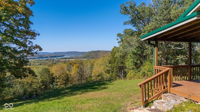 8701 E Splinter Ridge Rd, Madison, IN 47250 - view of green lawn featuring a deck with water view and a forest view