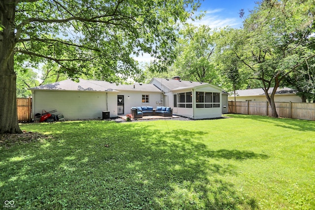 5456 N Park Dr, Indianapolis, IN 46220 - back of property with an outdoor hangout area, a sunroom, and a fenced backyard