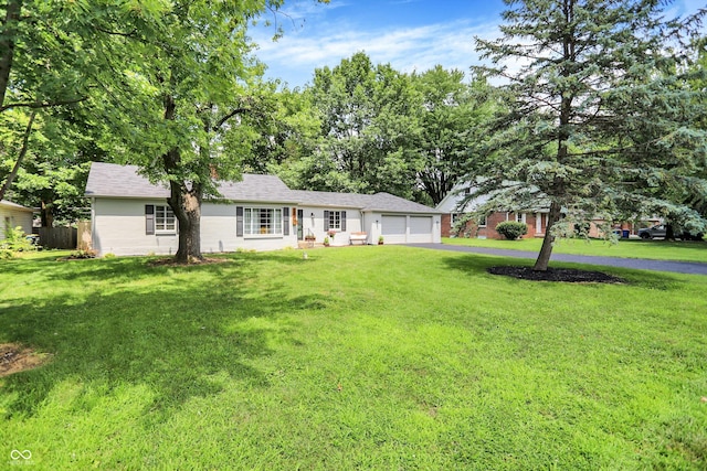 5456 N Park Dr, Indianapolis, IN 46220 - ranch-style home with a garage, a front lawn, and driveway