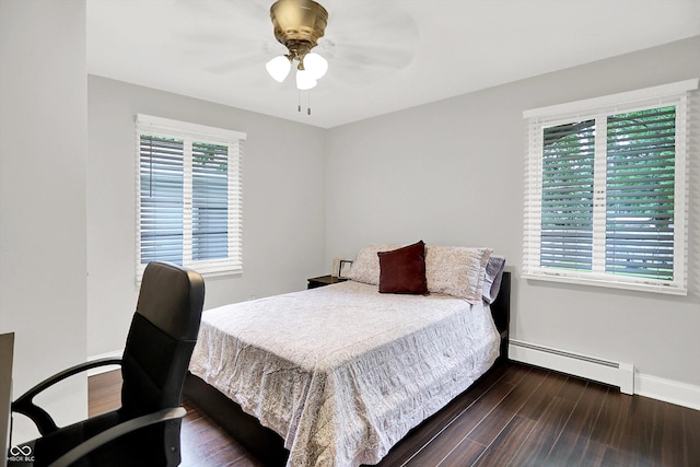 5456 N Park Dr, Indianapolis, IN 46220 - bedroom featuring a baseboard radiator, dark wood finished floors, and ceiling fan