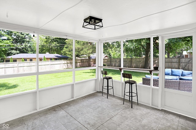 5456 N Park Dr, Indianapolis, IN 46220 - sunroom featuring an outdoor living space