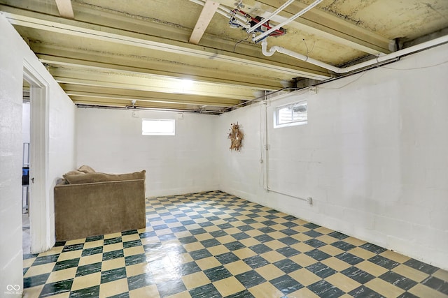 5456 N Park Dr, Indianapolis, IN 46220 - below grade area featuring plenty of natural light, tile patterned floors, and concrete block wall