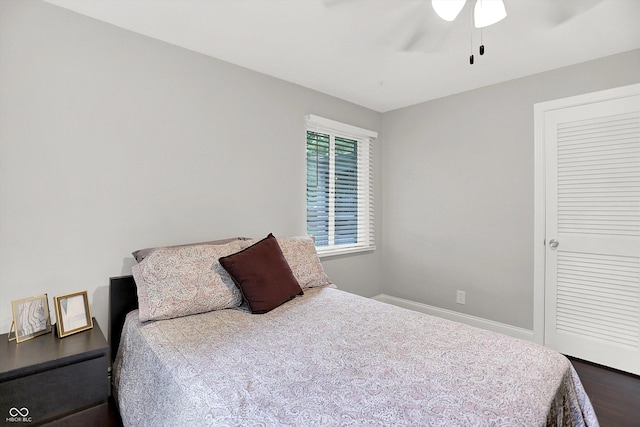 5456 N Park Dr, Indianapolis, IN 46220 - bedroom featuring a ceiling fan and wood finished floors