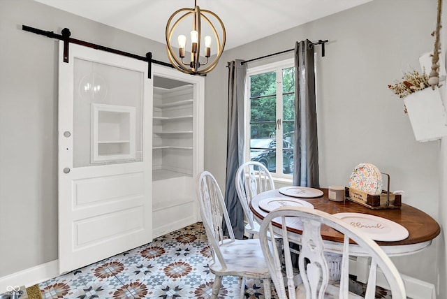 5456 N Park Dr, Indianapolis, IN 46220 - dining space with a barn door and a chandelier