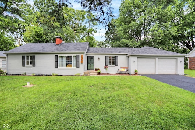 5456 N Park Dr, Indianapolis, IN 46220 - single story home with asphalt driveway, a front lawn, a garage, and a chimney