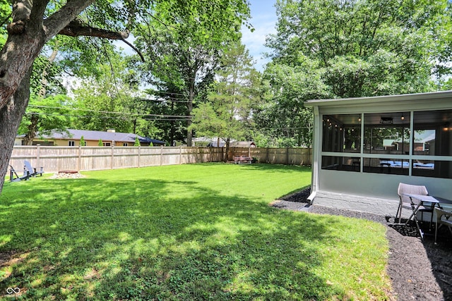 5456 N Park Dr, Indianapolis, IN 46220 - fenced backyard featuring a sunroom and view of scattered trees