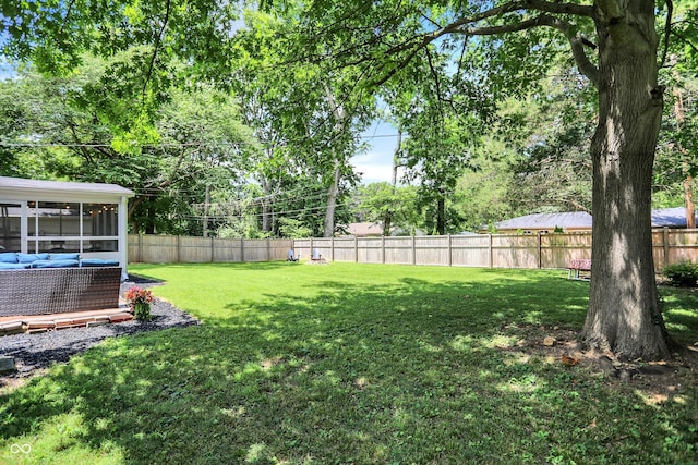 5456 N Park Dr, Indianapolis, IN 46220 - fenced backyard with a sunroom and an outdoor hangout area
