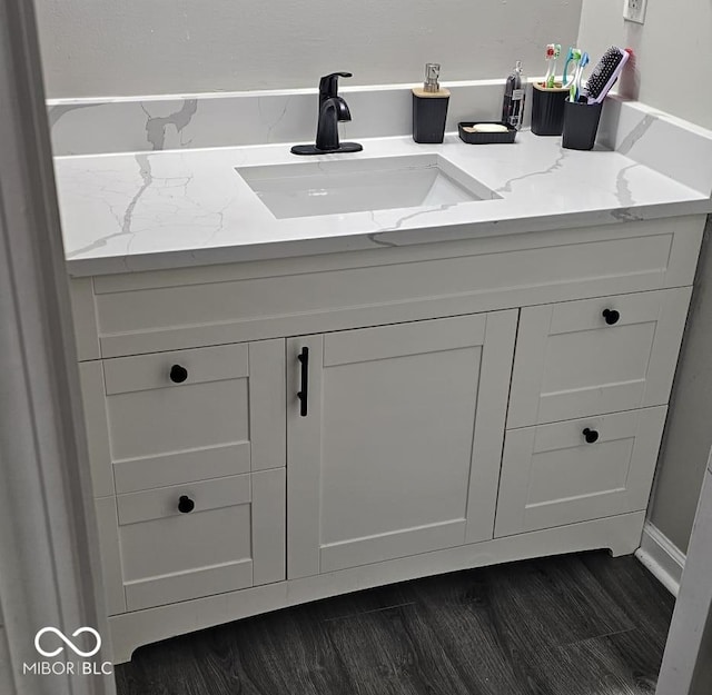 5648 Hyacinth Way, Indianapolis, IN 46254 - bathroom with vanity and wood finished floors