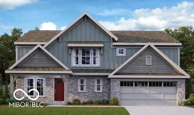 9938 Denim Dr, Indianapolis, IN 46239 - craftsman-style home with driveway, brick siding, board and batten siding, and a garage