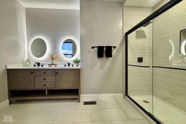 1440 S New Jersey St, Indianapolis, IN 46225 - full bath featuring double vanity, a stall shower, and tile patterned floors