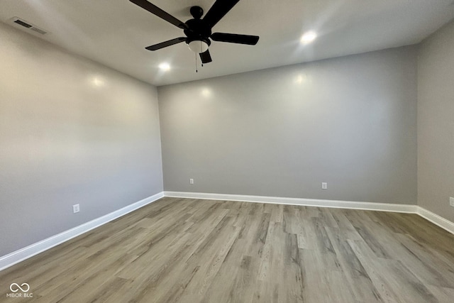 1440 S New Jersey St, Indianapolis, IN 46225 - unfurnished room with a ceiling fan, wood finished floors, and recessed lighting