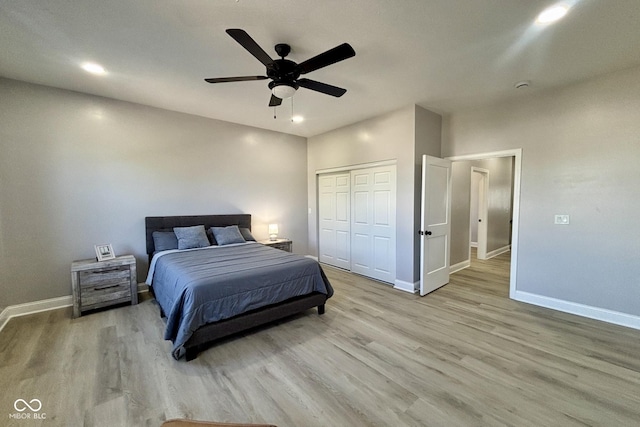 1440 S New Jersey St, Indianapolis, IN 46225 - bedroom with wood finished floors, a closet, ceiling fan, and recessed lighting