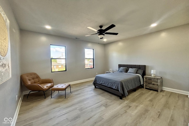 1440 S New Jersey St, Indianapolis, IN 46225 - bedroom with light wood-style floors, recessed lighting, and a ceiling fan