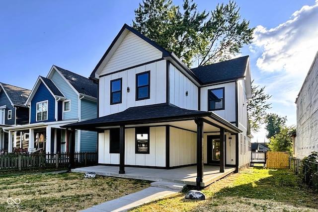 1440 S New Jersey St, Indianapolis, IN 46225 - modern inspired farmhouse featuring board and batten siding, covered porch, and roof with shingles