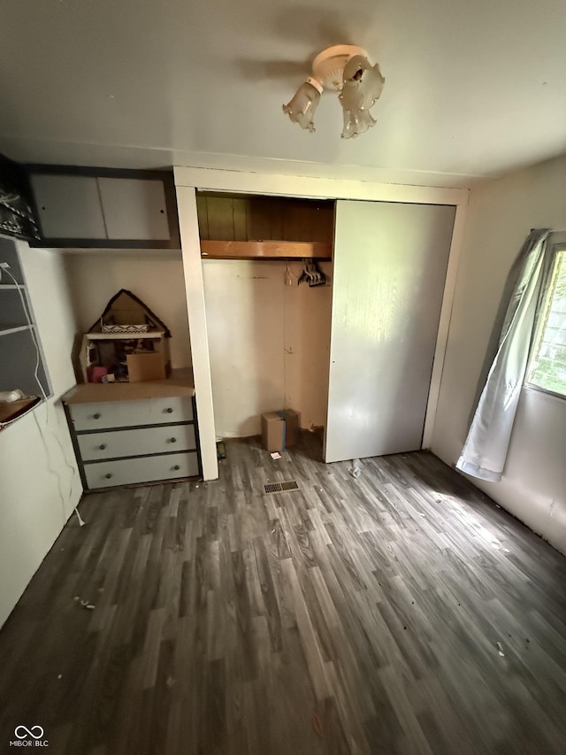 133 Michigan St, Clayton, IN 46118 - unfurnished bedroom featuring wood finished floors