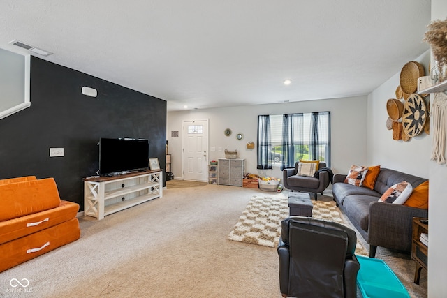197 N Fairfield Dr, Danville, IN 46122 - carpeted living room featuring recessed lighting and an accent wall