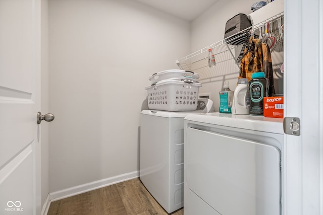 197 N Fairfield Dr, Danville, IN 46122 - laundry area with independent washer and dryer and wood finished floors