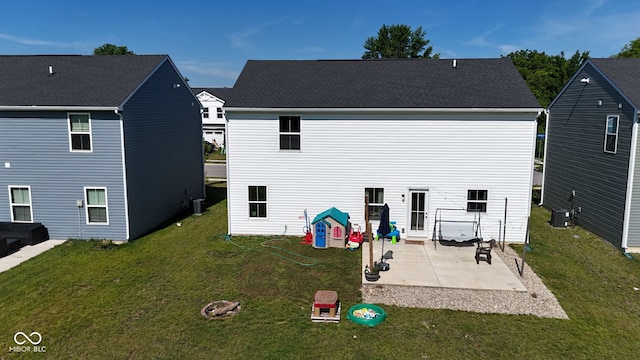 197 N Fairfield Dr, Danville, IN 46122 - rear view of house with a patio area and a yard