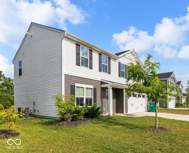 197 N Fairfield Dr, Danville, IN 46122 - view of front facade with an attached garage, concrete driveway, and a front lawn