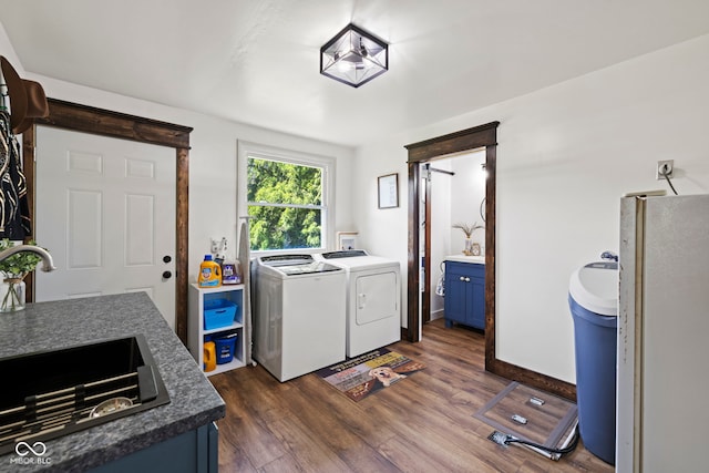 631 S State Road 39, Danville, IN 46122 - laundry room featuring washer and clothes dryer and dark wood finished floors