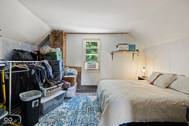 631 S State Road 39, Danville, IN 46122 - bedroom featuring lofted ceiling, cooling unit, and wood finished floors