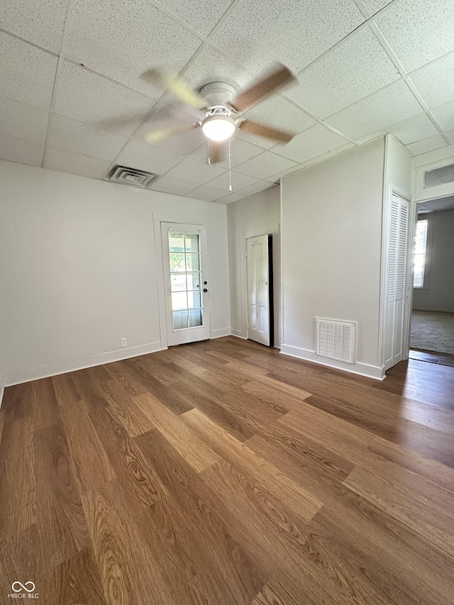107 S Nebraska St, North Salem, IN 46165 - unfurnished room featuring a paneled ceiling, ceiling fan, and wood finished floors