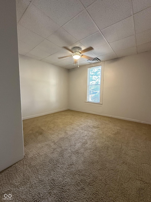 107 S Nebraska St, North Salem, IN 46165 - unfurnished room with a drop ceiling, carpet, and ceiling fan