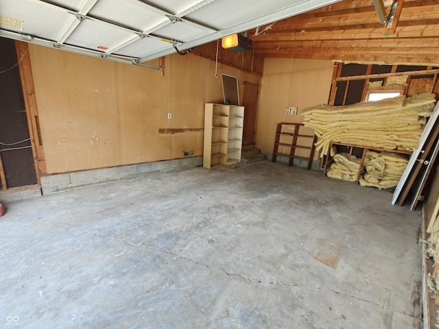 316 E Mechanic St, Shelbyville, IN 46176 - garage featuring a garage door opener