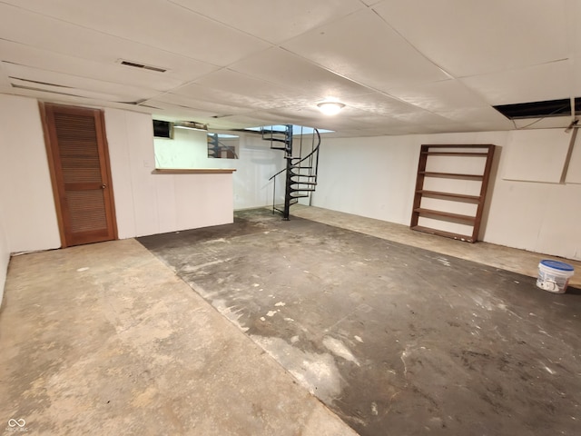 316 E Mechanic St, Shelbyville, IN 46176 - finished below grade area featuring stairway and a paneled ceiling
