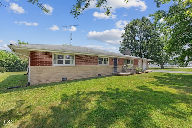 10816 N US Highway 231, Cloverdale, IN 46120 - ranch-style house featuring a front yard, a chimney, stone siding, an attached garage, and driveway