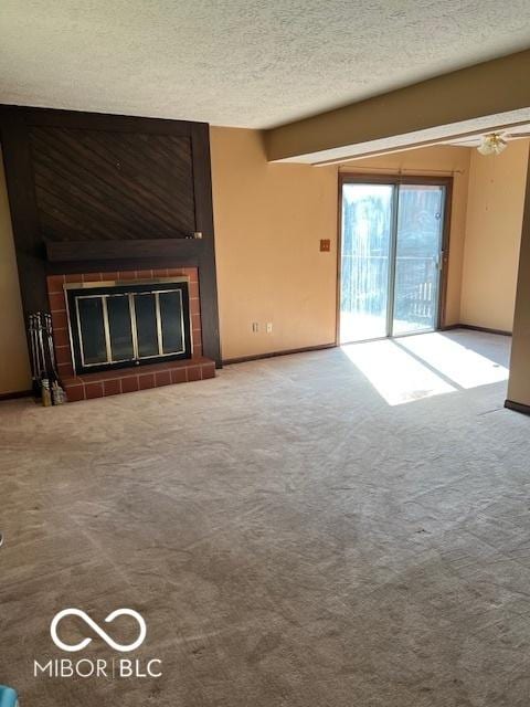2804 Punto Alto Cir, Indianapolis, IN 46227 - unfurnished living room with a fireplace, carpet flooring, and a textured ceiling