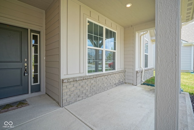 2541 Riviera Pl, Greenwood, IN 46143 - view of exterior entry featuring brick siding and a porch