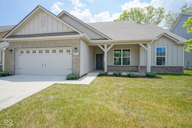 2541 Riviera Pl, Greenwood, IN 46143 - craftsman-style home with board and batten siding, brick siding, a garage, and driveway