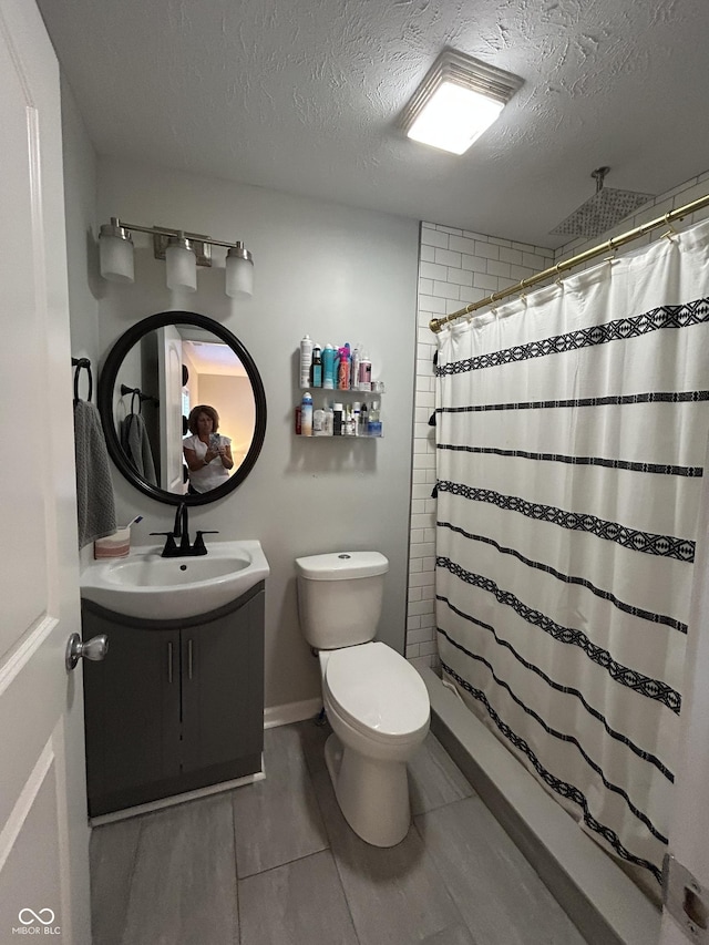 315 W N St, Crawfordsville, IN 47933 - bathroom featuring vanity, a shower with curtain, and a textured ceiling